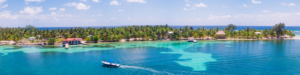 Aerial Drone view of South Water Caye tropical island in Belize barrier reef. A typical Caribbean island with turquoise water