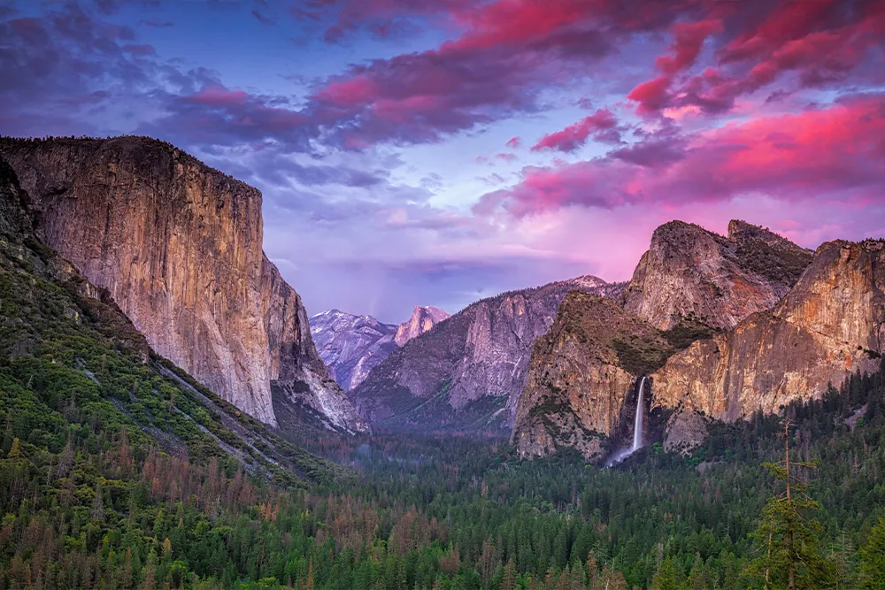 Sunset with pink, blue, and purple skys at Yosemite National Park - **NEEDS PHOTO CREDIT**